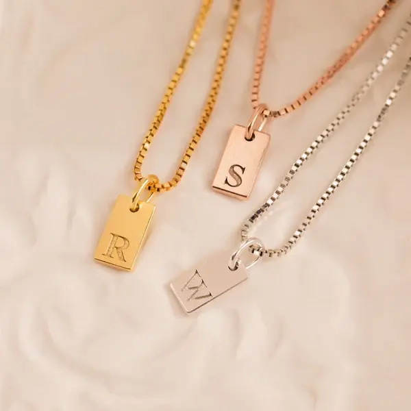 Second image of Personalized Gold Initial Tag Necklace – Engraved Rectangular Pendant